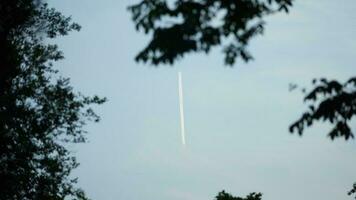 The clear sky view with an airplane flying in the sky photo