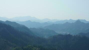 The beautiful mountains view from the top of the hill in spring photo