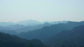 The beautiful mountains view from the top of the hill in spring photo