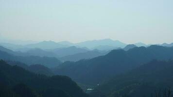 The beautiful mountains view from the top of the hill in spring photo