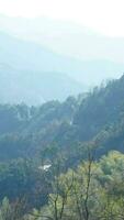 The beautiful mountains view from the top of the hill in spring photo