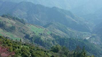 The beautiful mountains view from the top of the hill in spring photo