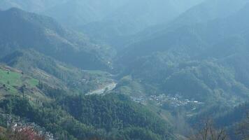 The beautiful mountains view from the top of the hill in spring photo