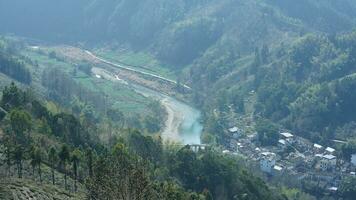 The mountains and valley view with the river running through them in spring photo