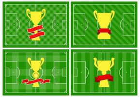 Set of four football fields with different golden cup on different green grass ornaments. Soccer field for playing. Vector illustration