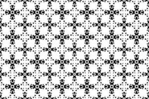 Seamless batik pattern,geometric tribal pattern,it resembles ethnic boho,aztec style,ikat style.luxury decorative fabric black and white seamless pattern for famous banners. vector