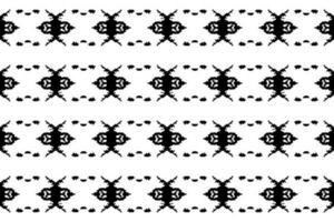Seamless batik pattern,geometric tribal pattern,it resembles ethnic boho,aztec style,ikat style.luxury decorative fabric black and white seamless pattern for famous banners. vector