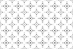 Seamless batik pattern,geometric tribal pattern,it resembles ethnic boho,aztec style,ikat style.luxury decorative fabric black and white seamless pattern for famous banners. vector