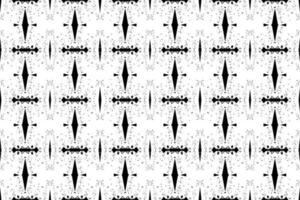 Seamless batik pattern,geometric tribal pattern,it resembles ethnic boho,aztec style,ikat style.luxury decorative fabric black and white seamless pattern for famous banners. vector