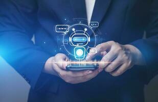 Online customer service by intelligent digital AI Chatbot application. Businessmen chat online with AI chatbots on smartphones. technology innovation robot, communication and answer with fast process. photo