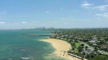 Dendy Street Beach in Melbourne Seen From the Air with the Melbourne Skyline video