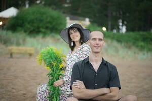 Romantic young couple in love on the beach photo