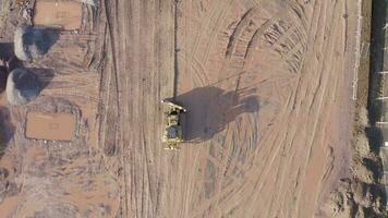 Bulldozer Using GPS Technology to Move Earth during Groundworks video