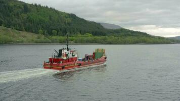 Commercial Ship Traversing a Lake on an Overcast Day video