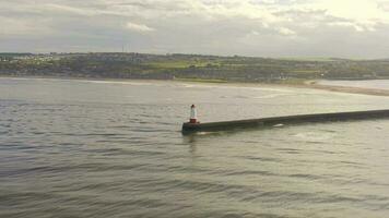 Berwick Breakwater and a Lighthouse in the Summer video