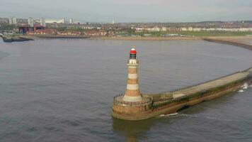 A Lighthouse and Pier in the Early Morning video