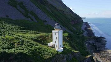A Square Lighthouse on a Cliff Edge Aerial View video