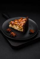 Delicious fresh cheesecake cake or snickers with cream and nuts photo