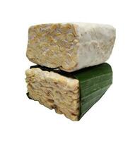Raw Tempeh or Tempe, Indonesian traditional food, made from fermented soybeans, On White Background. photo