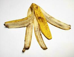 Banana peel on white background photo