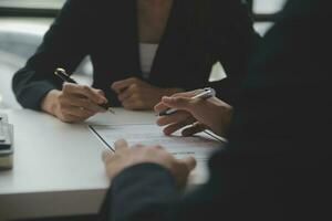 Close up view of job interview in office, focus on resume writing tips, employer reviewing good cv of prepared skilled applicant, recruiter considering application, hr manager making hiring decision photo