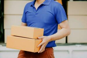 Business woman start up small business entrepreneur SME success .freelance woman working at home with Online Parcel delivery. SME and packaging deliveryconcept photo