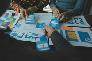 ux Graphic designer creative sketch planning application process development prototype wireframe for web mobile phone . User experience concept. photo