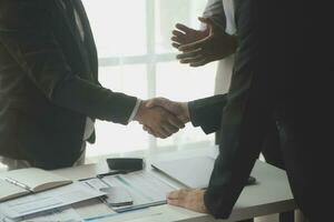 Team of business people working together in the meeting room office, teamwork background charts and graphs banner, double exposure successful teamwork,business planning concept. photo