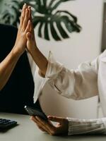 Financial Business team present. Business man hands hold documents with financial statistic stock photo, discussion, and analysis report data the charts and graphs. Finance Financial concept photo