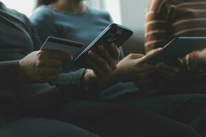 Close up of woman hand using credit card and laptop for payment and online shopping, Online shopping, payments digital banking, E-commerce concept. photo