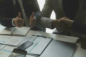 Team of business people working together in the meeting room office, teamwork background charts and graphs banner, double exposure successful teamwork,business planning concept. photo