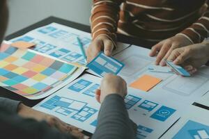 ux Graphic designer creative sketch planning application process development prototype wireframe for web mobile phone . User experience concept. photo
