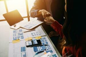 ux Graphic designer creative sketch planning application process development prototype wireframe for web mobile phone . User experience concept. photo