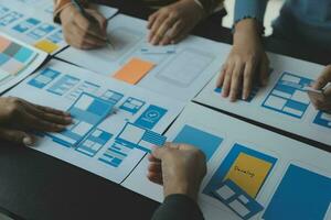 ux Graphic designer creative sketch planning application process development prototype wireframe for web mobile phone . User experience concept. photo