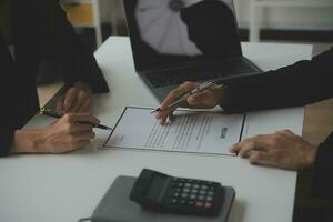 Close up view of job interview in office, focus on resume writing tips, employer reviewing good cv of prepared skilled applicant, recruiter considering application, hr manager making hiring decision photo