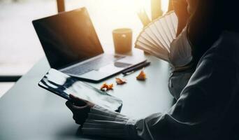 Financial Business team present. Business man hands hold documents with financial statistic stock photo, discussion, and analysis report data the charts and graphs. Finance Financial concept photo
