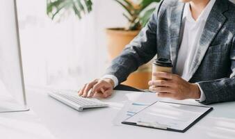 Document Businessman working modern computer Document Management System , Virtual online documentation database and process automation to efficiently manage files, photo