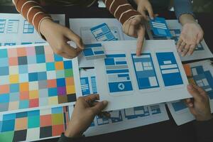 ux Graphic designer creative sketch planning application process development prototype wireframe for web mobile phone . User experience concept. photo