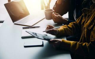 Financial Business team present. Business man hands hold documents with financial statistic stock photo, discussion, and analysis report data the charts and graphs. Finance Financial concept photo