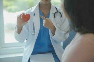 Male patient having consultation with doctor or psychiatrist who working on diagnostic examination on men's health disease or mental illness in medical clinic or hospital mental health service center photo