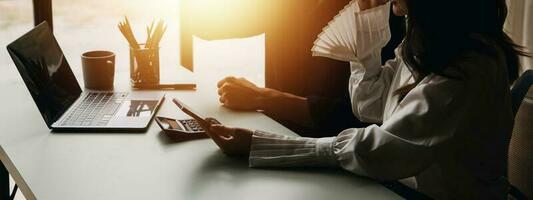 Financial Business team present. Business man hands hold documents with financial statistic stock photo, discussion, and analysis report data the charts and graphs. Finance Financial concept photo