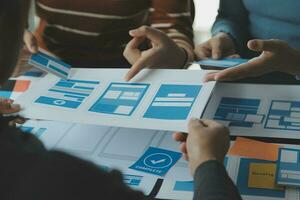 ux Graphic designer creative sketch planning application process development prototype wireframe for web mobile phone . User experience concept. photo