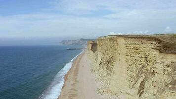 Sandstone Rock Formation Cliff Along West Bay in England video