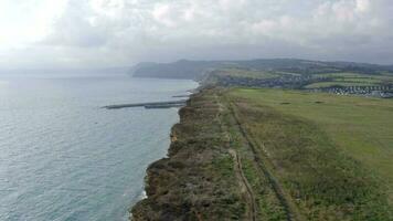 zandsteen rots vorming klif langs west baai in Engeland video