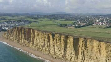 West Bay Sandstone Cliffs Overlooking the Sea in England video