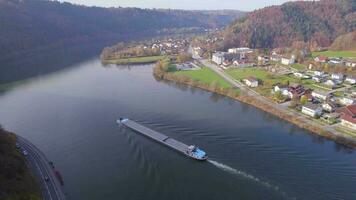 Cargo Pusher Boat on a River Transporting Cargo and Goods Along a River Bend video