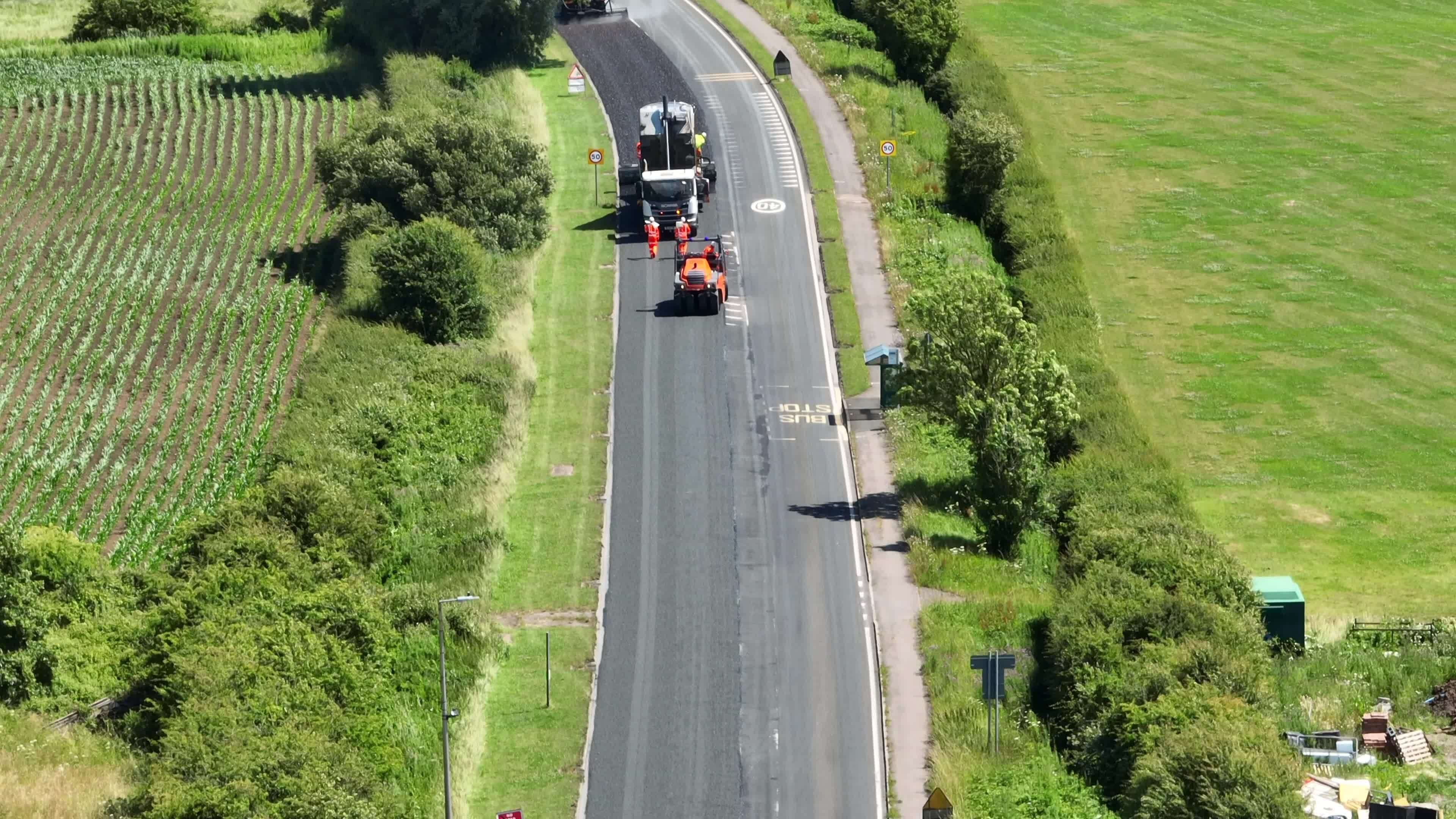 Road Resurfacing Aerial View Of Surface Dressing Micro Asphalt Process road-resurfacing-aerial-view-of-surface-dressing-micro-asphalt-process