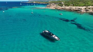 Luxury Superyacht Anchored at Sea in Ibiza Near Cala Bassa video