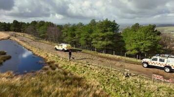 Mountain Rescue Ambulance Vehicles Driving to Reach and Emergency video