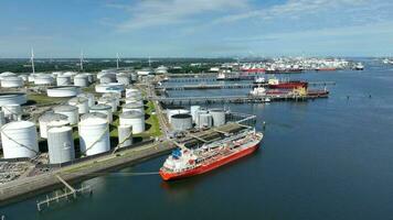 Crude Oil Tanker Vessel Unloading Petrochemicals to a Shore Fuel Depot video